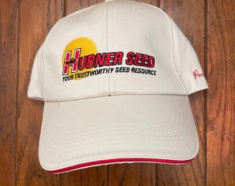 Gorra de béisbol con correa trasera de Hubner Seed Farm de stock antiguo