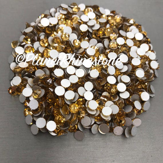 Light Col. Topaz / 10 Gross / SS20 / Flat back / Egyptian Crystals