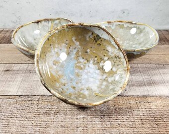 Handmade ceramic bowl with beautiful glaze work. Functional and fancy. Blue and brown food safe glazes. The perfect gift.