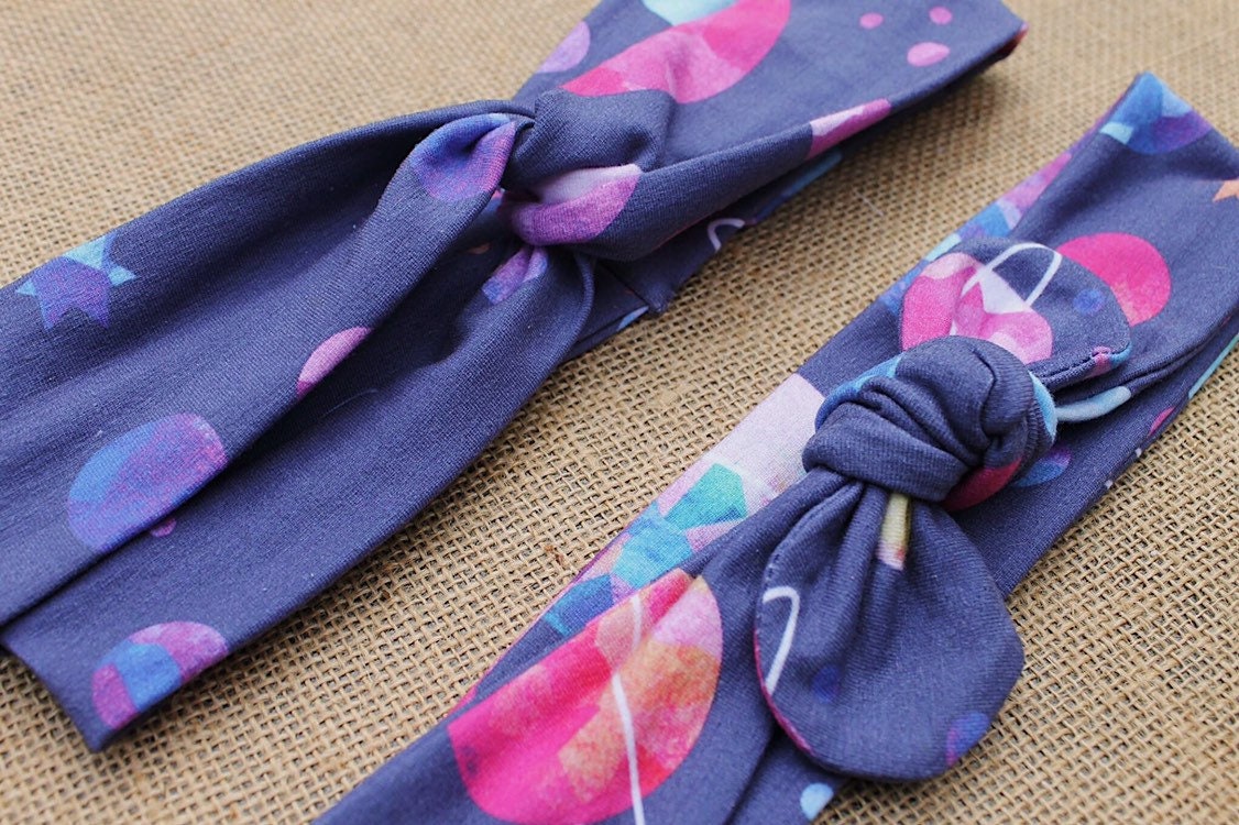 KNOT FRONT TURBAN COMING DOWN FROM COSMOS