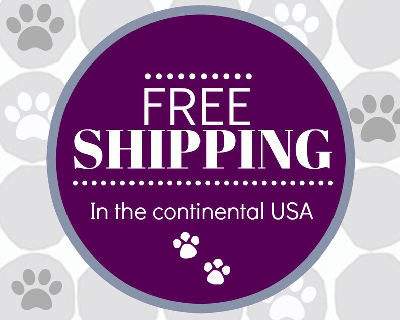 May include: Purple circle with white text that says "FREE SHIPPING" and "In the continental USA". The circle is surrounded by a pattern of gray paw prints.