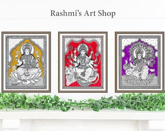 May include: Three framed black and white line drawings of Hindu goddesses. The first image features Lakshmi, the goddess of wealth, sitting on a lotus flower with a yellow background. The second image features Durga, the goddess of power, riding a tiger with a red background. The third image features Saraswati, the goddess of knowledge, playing a veena with a purple background. The title "Rashmi's Art Shop" is at the top of the image.