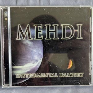 May include: A CD case with the title "MEHDI" in large, silver letters. The cover features a dark background with a planet and a crescent moon. The text "INSTRUMENTAL IMAGERY" is below the title.