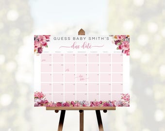 May include: A pink floral calendar with the text "Guess Baby Smith's due date" at the top. The calendar is for June and July and has a pink floral border.