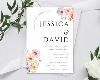 May include: Wedding invitation with a watercolor floral design. The invitation reads "You are invited to the wedding of Jessica & David, Saturday 16th October Twenty Twenty XXXX, at two o'clock in the afternoon, The Queen's Hotel, Leeds, West Yorkshire, Reception to follow."