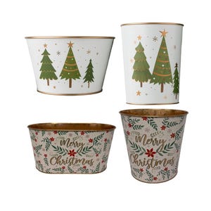 May include: Four white metal Christmas containers with gold rims. Two containers feature green Christmas trees and stars. The other two have a floral pattern with the words "Merry Christmas".