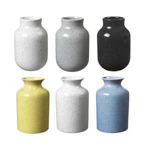 May include: Six speckled ceramic vases in different colours, including white, grey, black, yellow, and blue. The vases are all the same size and shape, with a round body and a narrow neck.