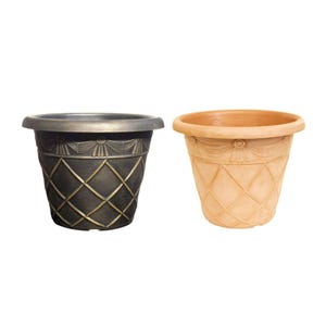 May include: Two decorative plant pots. One is dark bronze with a diamond pattern and a decorative band. The other is light tan with a similar diamond pattern and band. Both have a wide rim and are empty.