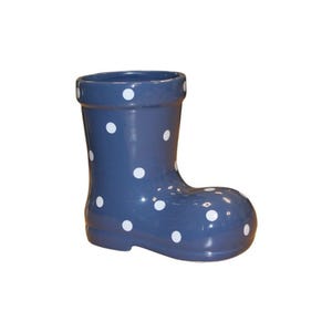 May include: A blue ceramic boot planter with white polka dots.