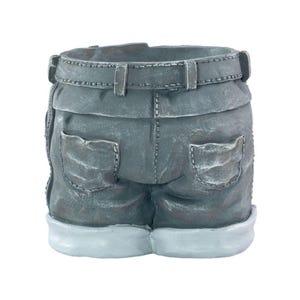 May include: A grey denim shorts-shaped planter with a belt and back pockets. The planter has a distressed finish, with light grey rolled cuffs. The design mimics the look of a pair of denim shorts.