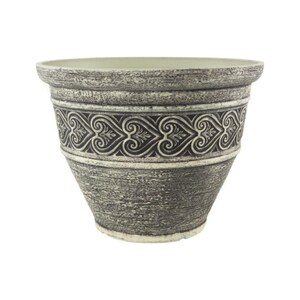 May include: A grey and white decorative planter with a textured finish. The planter features a band of ornate scrollwork around the middle. The rim and base have a lighter colour, creating a contrast with the darker body.