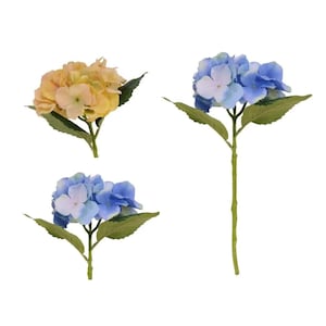 May include: Three artificial hydrangea stems are shown. One has yellow and peach flowers, the others have blue and white blooms. All stems have green leaves. The image is set against a white background.