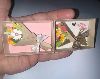 Tiny matchbox bouquet, huge feelings — proof you thought of them on purpose.