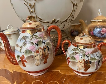 Adorable Tea Pot and Creamer Set