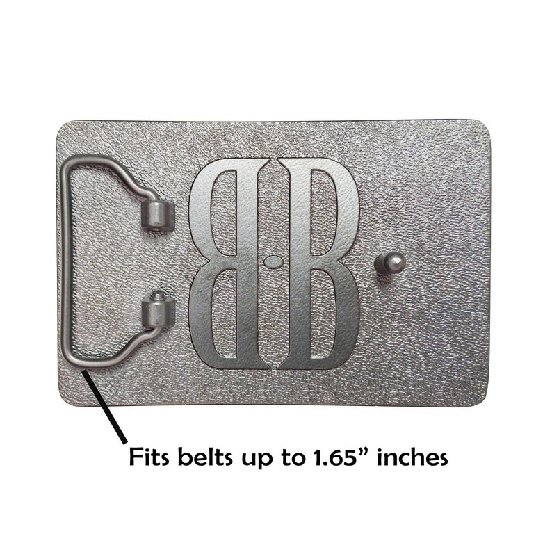 May include: Silver belt buckle with the letters "BB" engraved on it. Fits belts up to 1.65 inches wide.