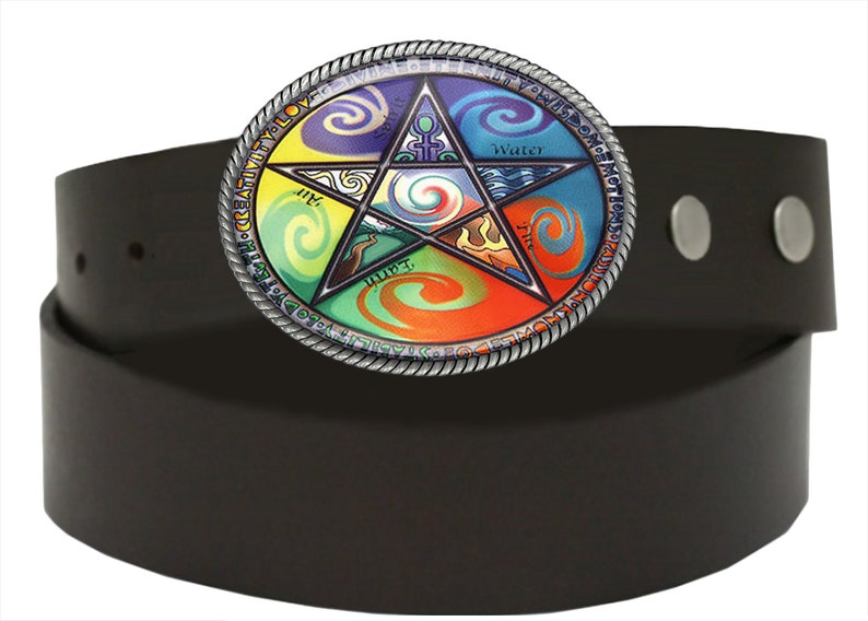 May include: A black leather belt with a silver buckle featuring a colorful pentagon with a five-pointed star in the center. The pentagon is divided into five sections, each representing an element: air, earth, fire, water, and spirit. The buckle is inscribed with the words "Creativity, Love, Wisdom, Power, and Magic".