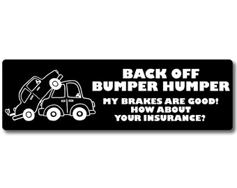 May include: Black and white sticker with a cartoon image of two cars, one driving into the back of the other. The text reads "Back Off Bumper Humper My Brakes Are Good! How About Your Insurance?"