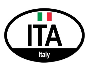 May include: Oval sticker with a black border, white interior, and a black base. The sticker features the letters "ITA" in bold black font, with the word "Italy" below. The Italian flag is depicted at the top.