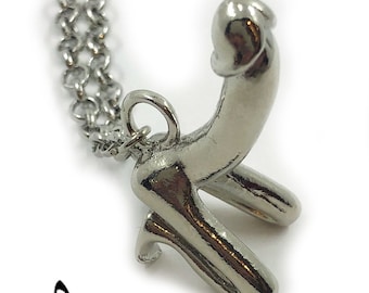 Necklace with a firm phallus pendant