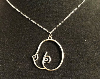 Necklace with a sexy breasts pendant