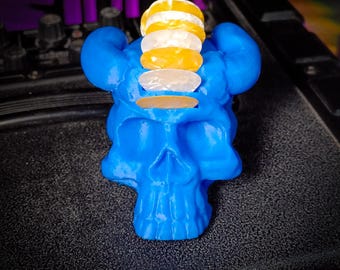 Soporte para púa de guitarra con forma de calavera cornuda (azul)