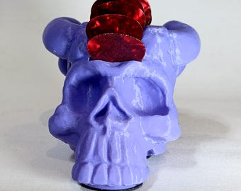Soporte para púa de guitarra con forma de calavera con cuernos (morado)