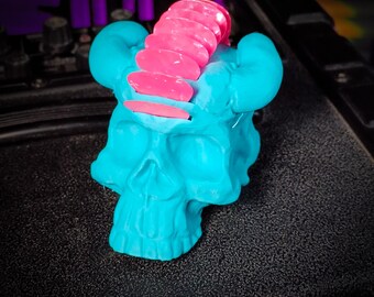 Soporte para púa de guitarra con forma de calavera cornuda (turquesa)