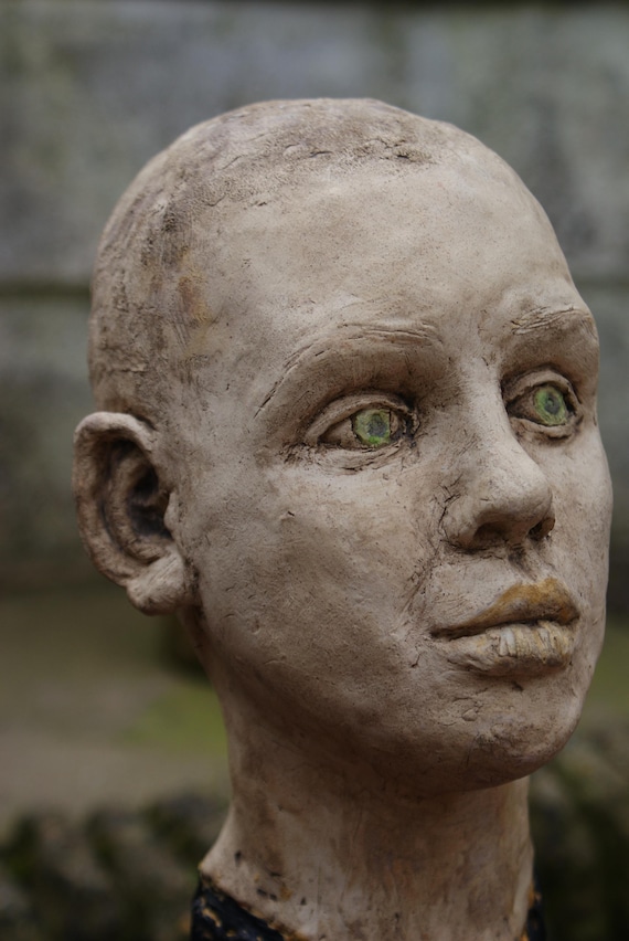 Male Bust Mounted On An Ebonised Base