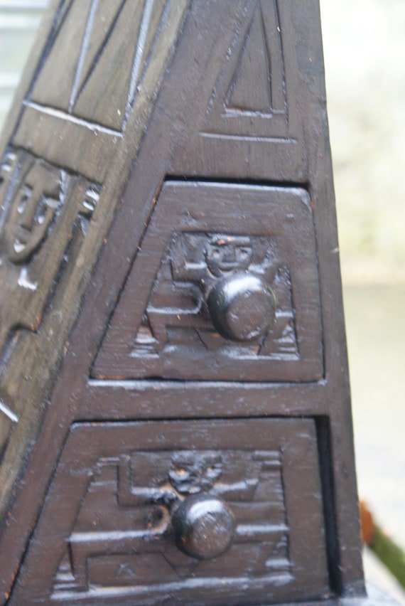 Small Carved African Triangular Drawers