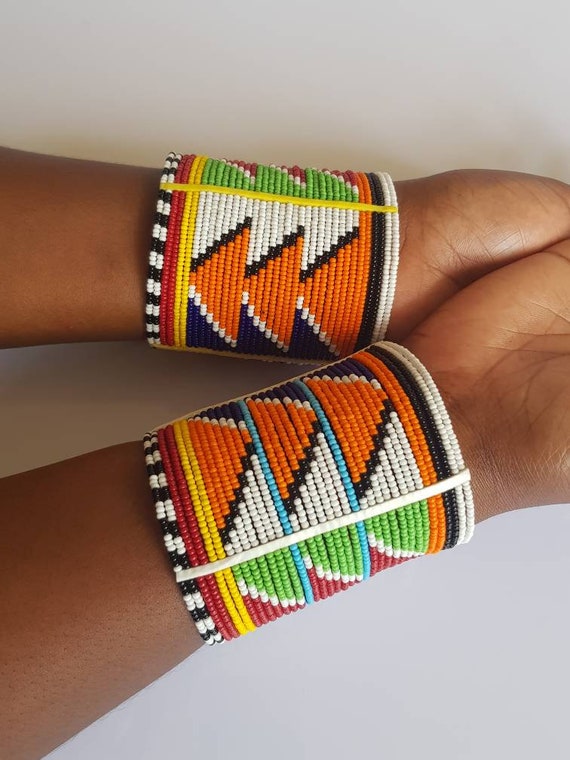 Close up of colourful bead bracelets worn by Maasai moran or warrior Masai  Mara National Reserve Kenya East Africa Stock Photo - Alamy