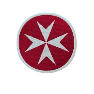 May include: A white Maltese cross embroidered on a red circular patch.