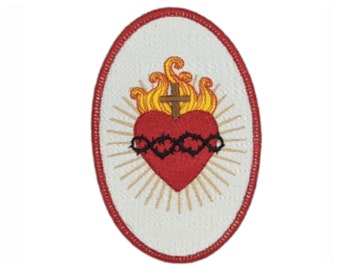 May include: Embroidered patch with a red heart with a crown of thorns and a cross on top, surrounded by flames and a golden halo. The patch is oval shaped with a red border.