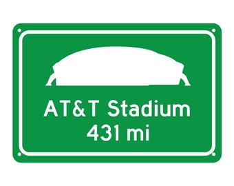 May include: A green rectangular sign with white text and a white stadium silhouette. The sign reads "AT&T Stadium" and "431 mi". The sign has a white border and rounded corners.