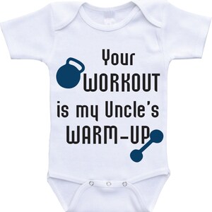 May include: White baby onesie with a blue kettlebell and dumbbell graphic. The text reads "Your workout is my uncle's warm-up."
