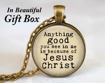 May include: A gold necklace with a round pendant featuring the text "Anything good you see in me is because of Jesus Christ".