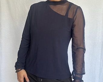 Top de manga larga con paneles técnicos de malla transparente de DKNY