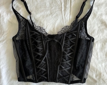 Top corsé negro transparente con paneles de malla y varillas de encaje de Victoria's Secret