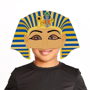 May include: A colorful Egyptian pharaoh mask with a gold face, black eyeliner, and a blue and gold headdress. The mask features a cobra and a vulture. The website address www.LMEPRINTABLES.Etsy.com is visible at the top.