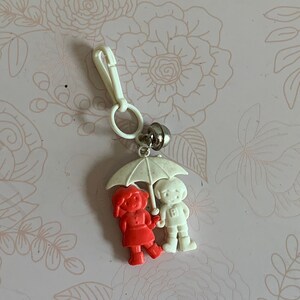 Vintage 80s Plastic Bell Charm: Couple Under Umbrella