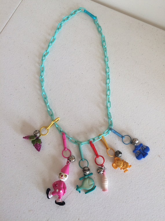 Vintage 80s Fashion Bell Charm Necklace Vintage Bell Charms Clown Bell Charm 1980s Plastic Bell Charm Necklace Etsy UK