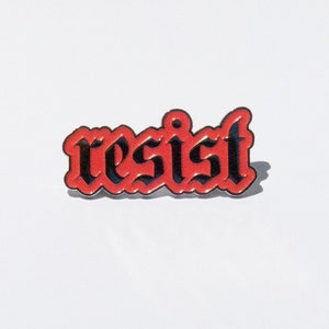 RESIST Enamel Pin image 1