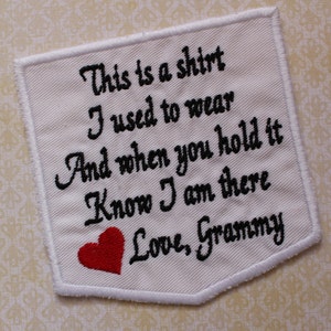 May include: White fabric patch with black embroidered text that reads "This is a shirt I used to wear And when you hold it Know I am there Love, Grammy". A red heart is embroidered below the text.
