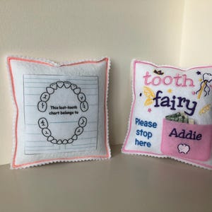 Named Tooth fairy pillow with tooth chart in back - comes in Blue, Pink, Red. Great as Christmas Stocking stuffer & birthday gift for kids