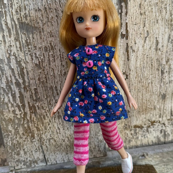 Fits 7 inch Lottie doll: floral top and striped leggings