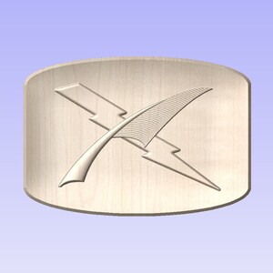 May include: A light-colored wooden emblem featuring a stylized feather and lightning bolt design. The emblem is circular and has a raised relief carving of the feather and lightning bolt. The background is a light blue color.