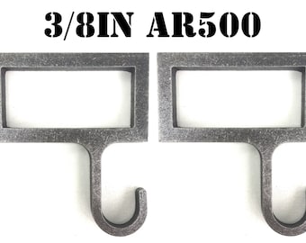 May include: Two 3/8 inch metal hooks with a rectangular frame. The hooks are silver in color and have a distressed finish.