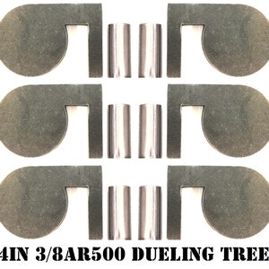May include: A set of six steel targets for shooting practice. The targets are 4 inches in diameter and have a 3/8 inch thick steel plate. The targets are designed for use with a dueling tree.