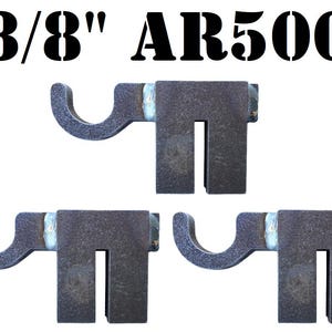 May include: Three 3/8" AR500 steel brackets. The brackets are made of heavy-duty steel and are designed to be used for a variety of applications.