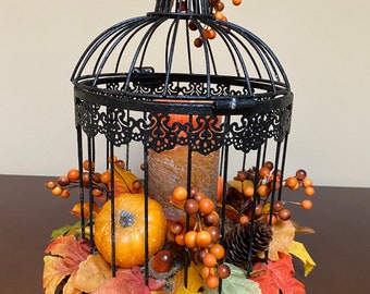 Beautiful Vintage Bird Cage Fall Floral Arrangement with a Fall-scented Pillar Candle