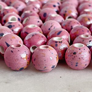10mm Round Pink Ceramic Beads || Pearlized Mottled Rose Pink Glaze with Speckles of Dark Blue and Yellow. Packs of 10, 20, & 40.